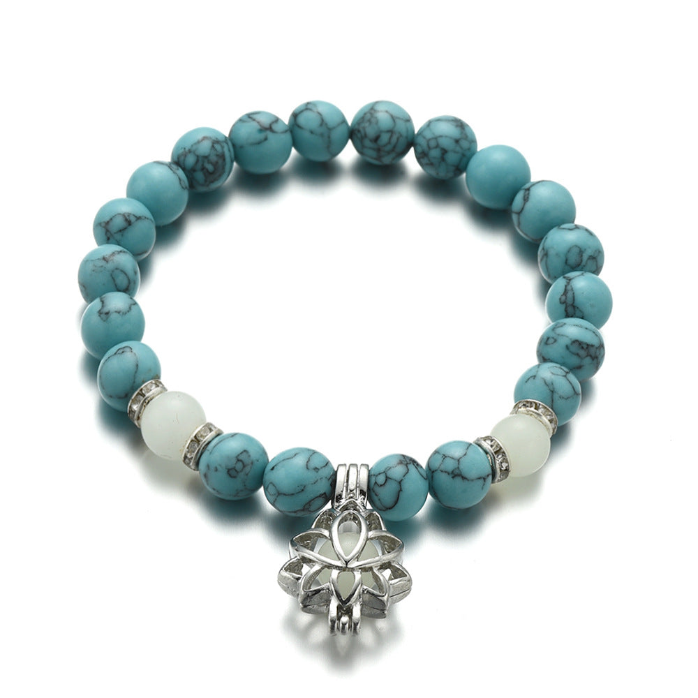 Turquoise Bead Bracelet with Lotus and Sanskrit Design