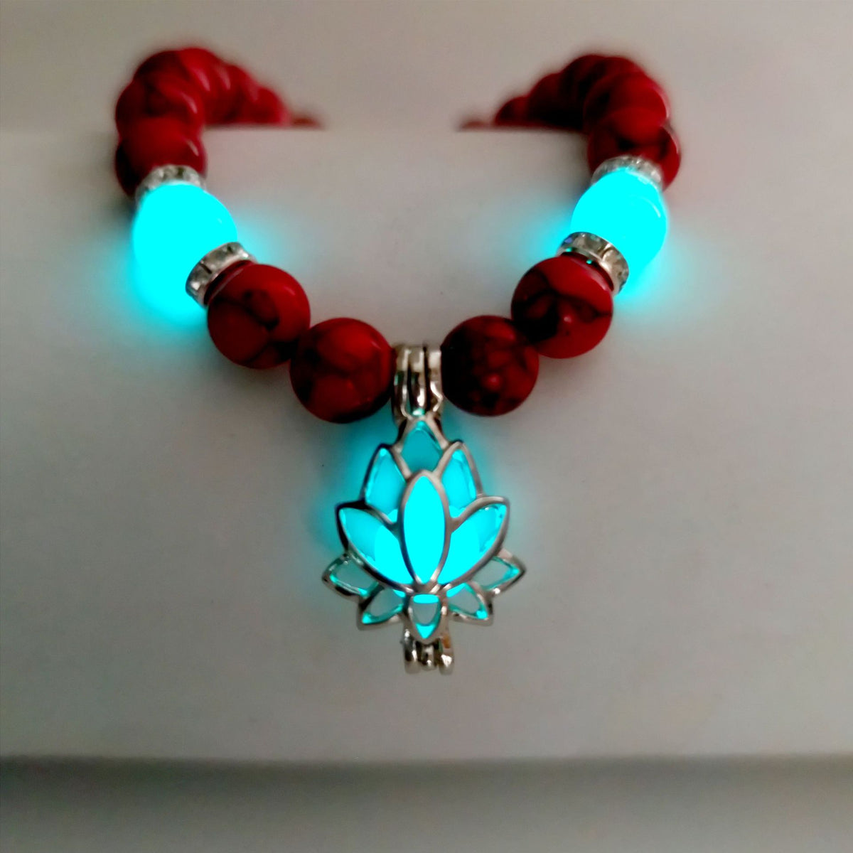 Turquoise Bead Bracelet with Lotus and Sanskrit Design
