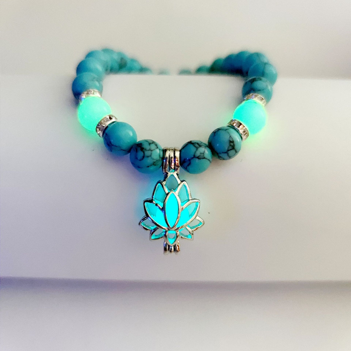 Turquoise Bead Bracelet with Lotus and Sanskrit Design
