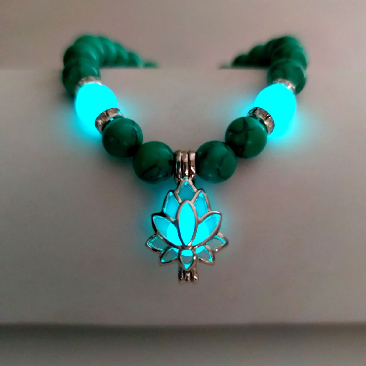 Turquoise Bead Bracelet with Lotus and Sanskrit Design