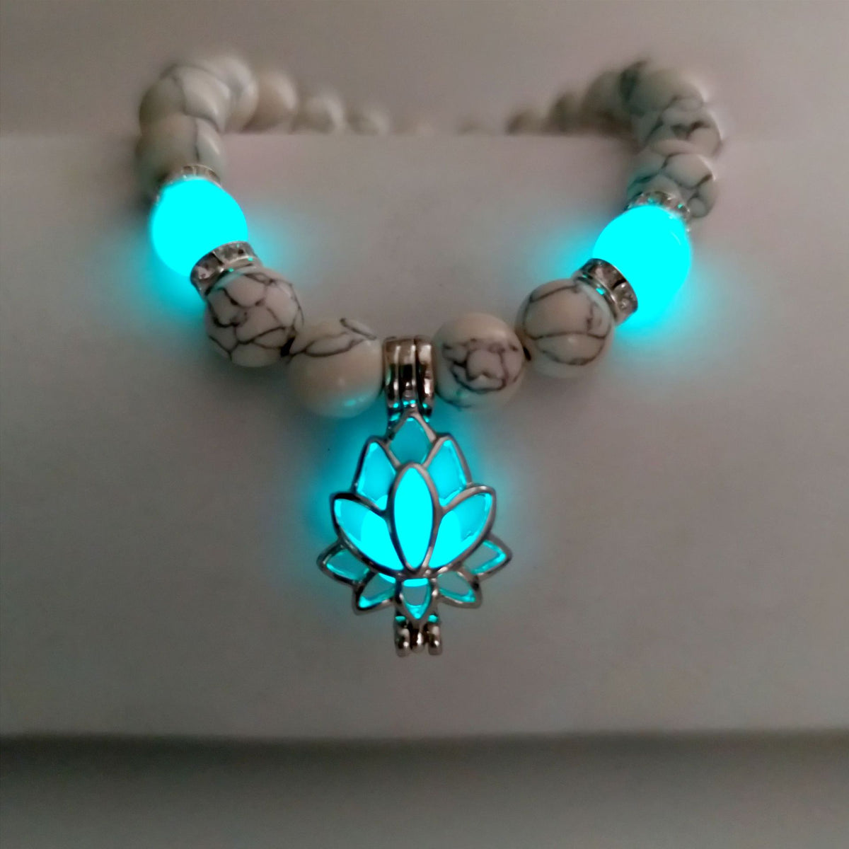 Turquoise Bead Bracelet with Lotus and Sanskrit Design