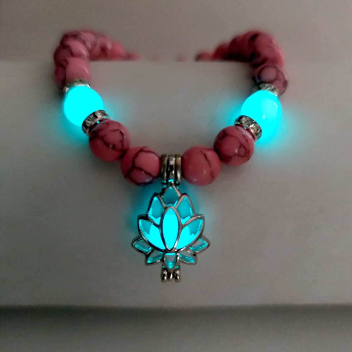 Turquoise Bead Bracelet with Lotus and Sanskrit Design