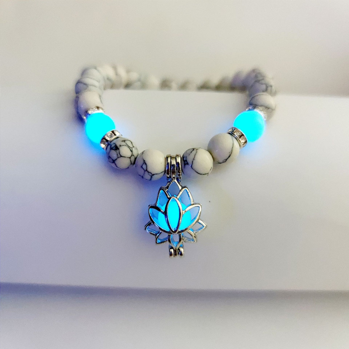 Turquoise Bead Bracelet with Lotus and Sanskrit Design